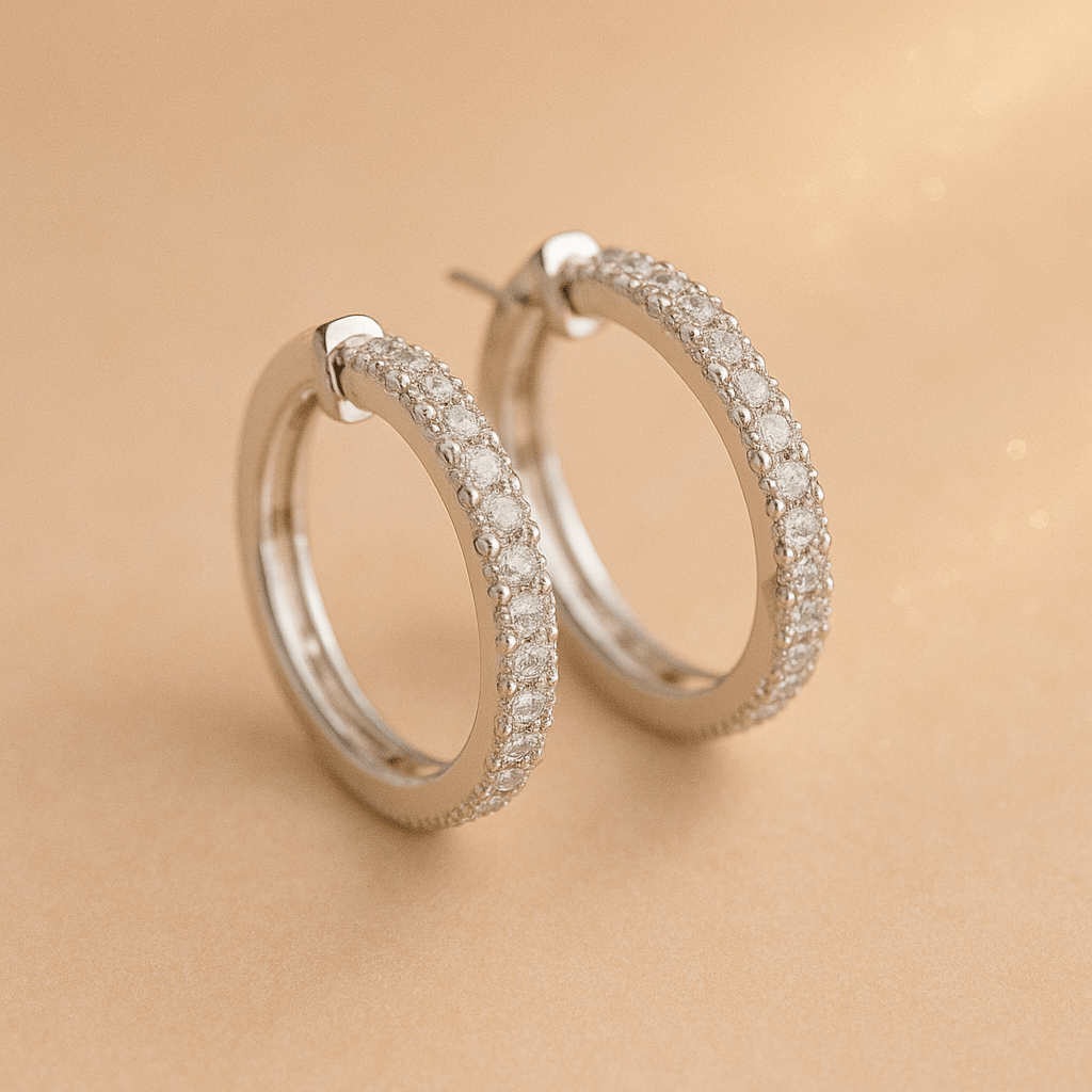 Pair of silver hoops earrings encrusted in diamonds